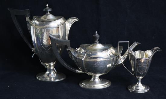 A matched late Victorian silver three piece part tea set, gross 33.5 oz.